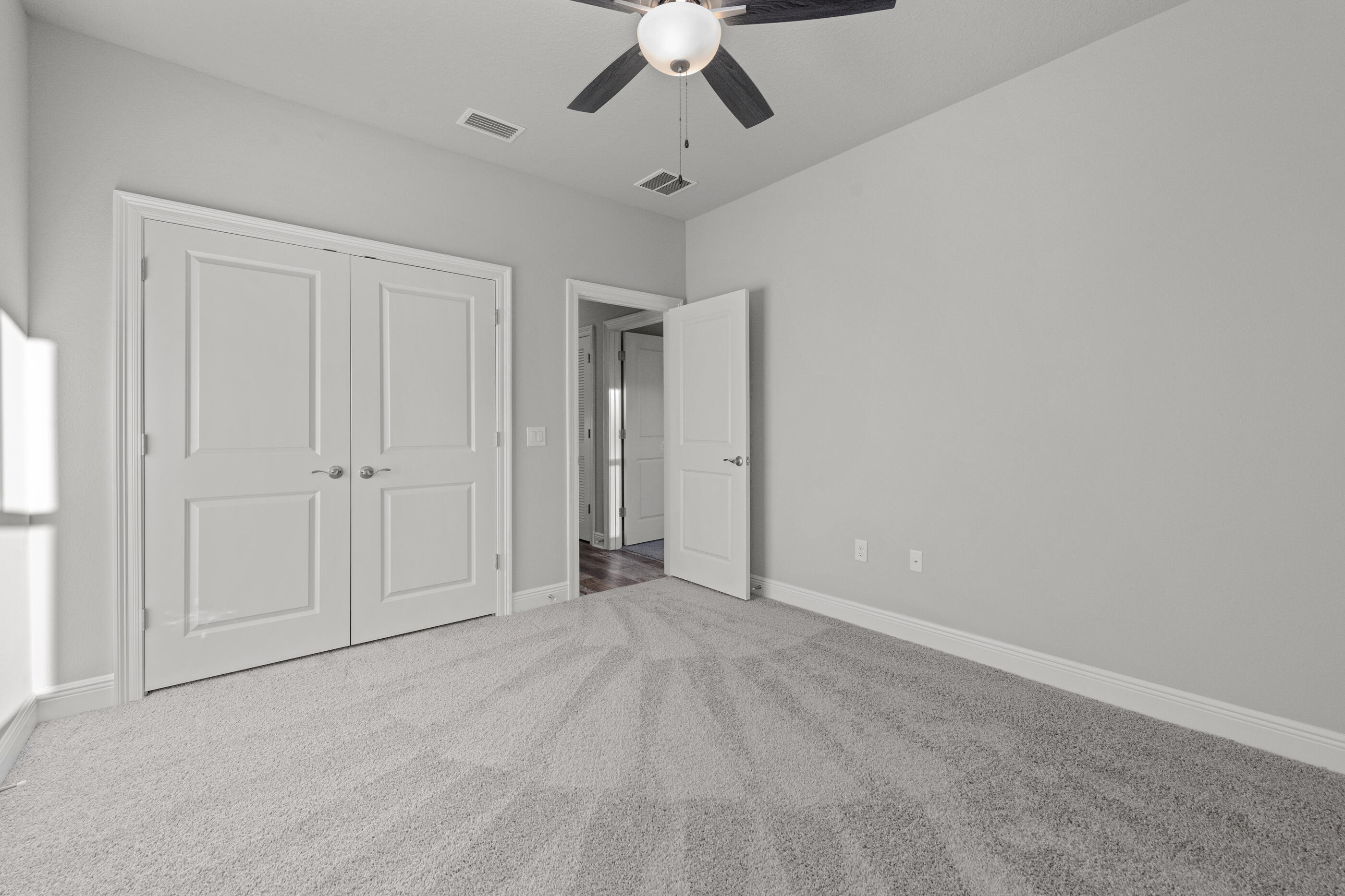 6699 Rocky Shores Road Milton, FL 32583 - Photo 55 of 77 wooden floor in an empty room