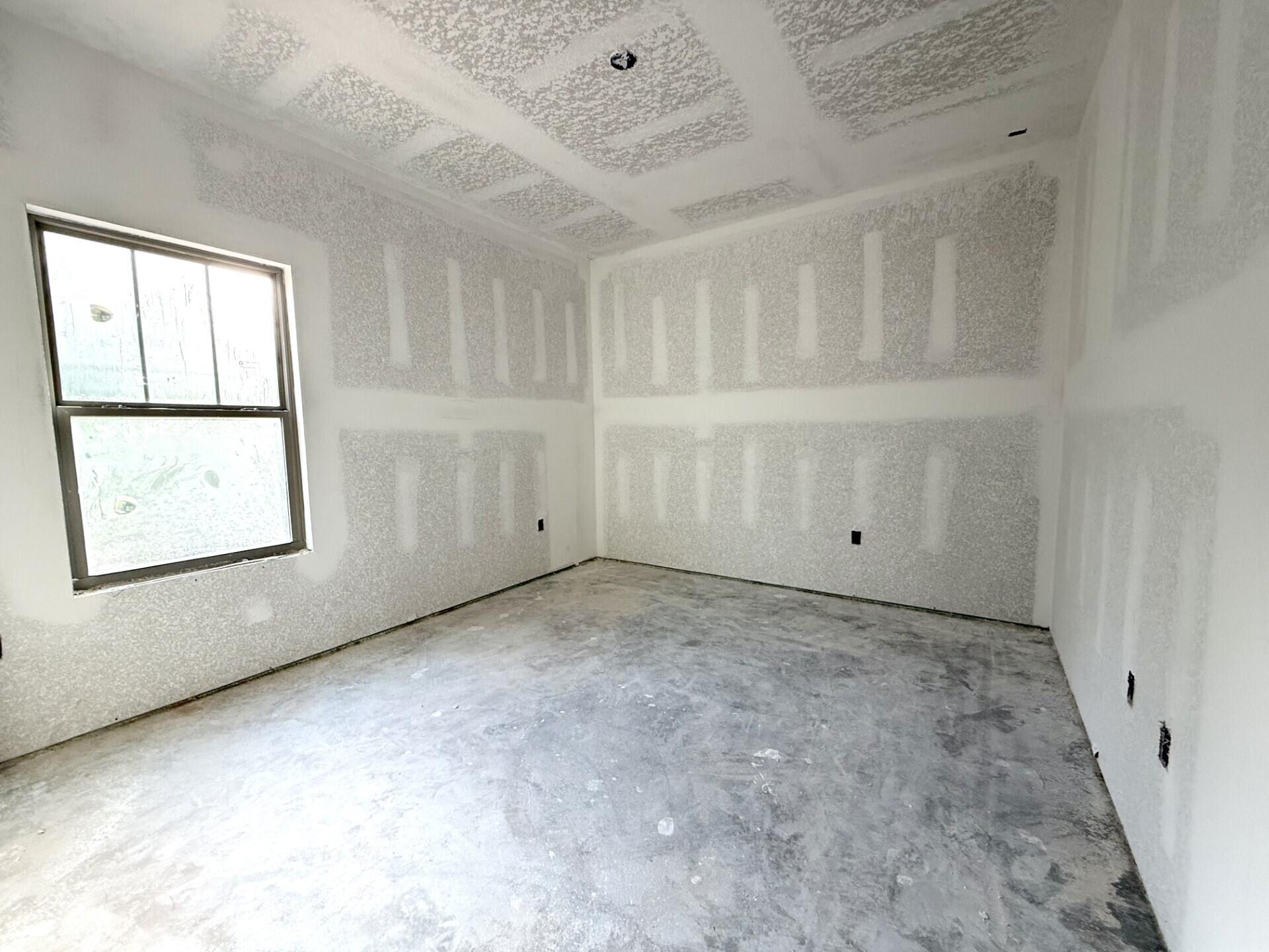 6699 Rocky Shores Road Milton, FL 32583 - Photo 65 of 77 a view of an empty room with a window