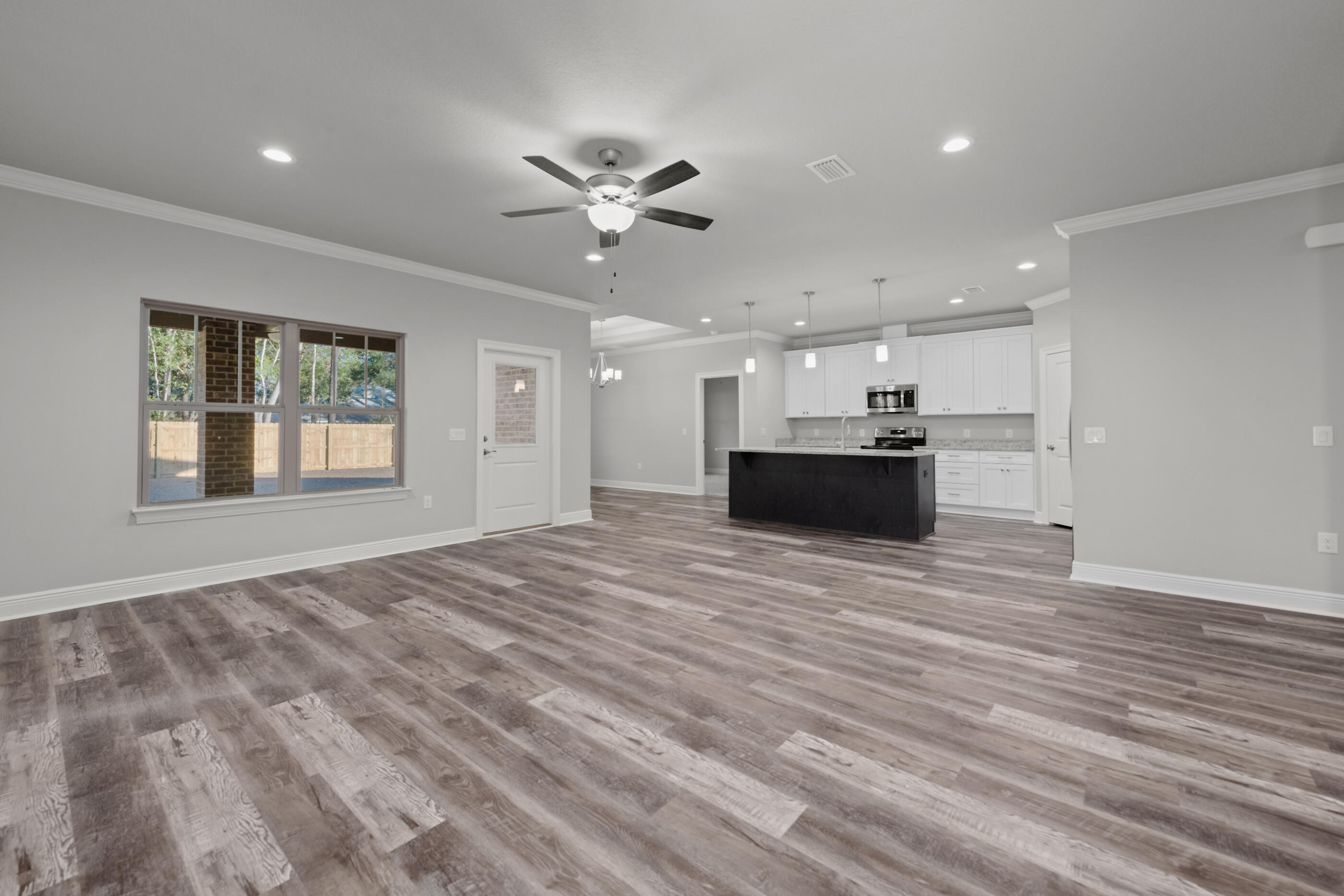 6699 Rocky Shores Road Milton, FL 32583 - Photo 8 of 77 Living Room from Back Hallway