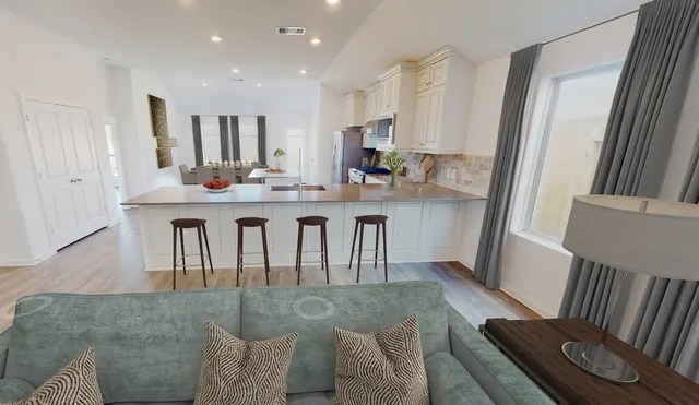 a view of kitchen with cabinets and wooden floor