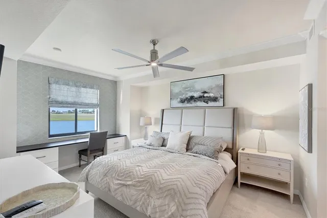 a large white bed in a white room