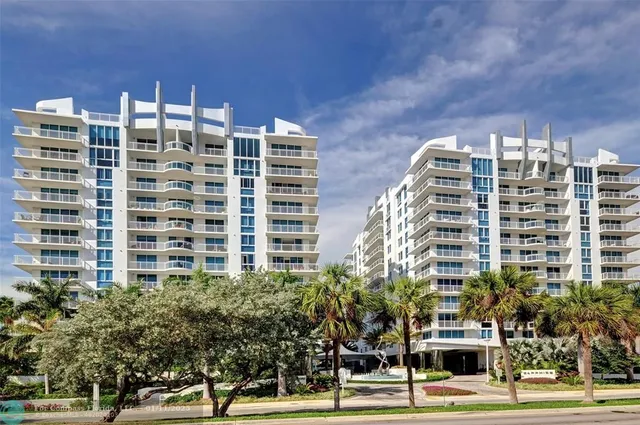 a front view of a building with a street