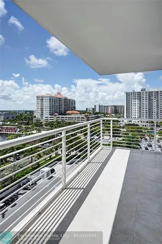 a view of a balcony with city view