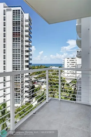 a view of a balcony with city view