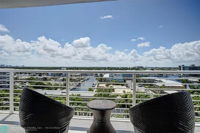 a picture of a fireplace with furniture