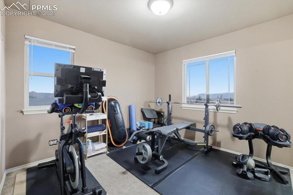 2374 Cinnabar Road Colorado Springs, CO 80921 - Photo 38 of 48 The fourth upper level bedroom is currently in use as an exercise room.
