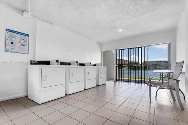a view of a livingroom with furniture