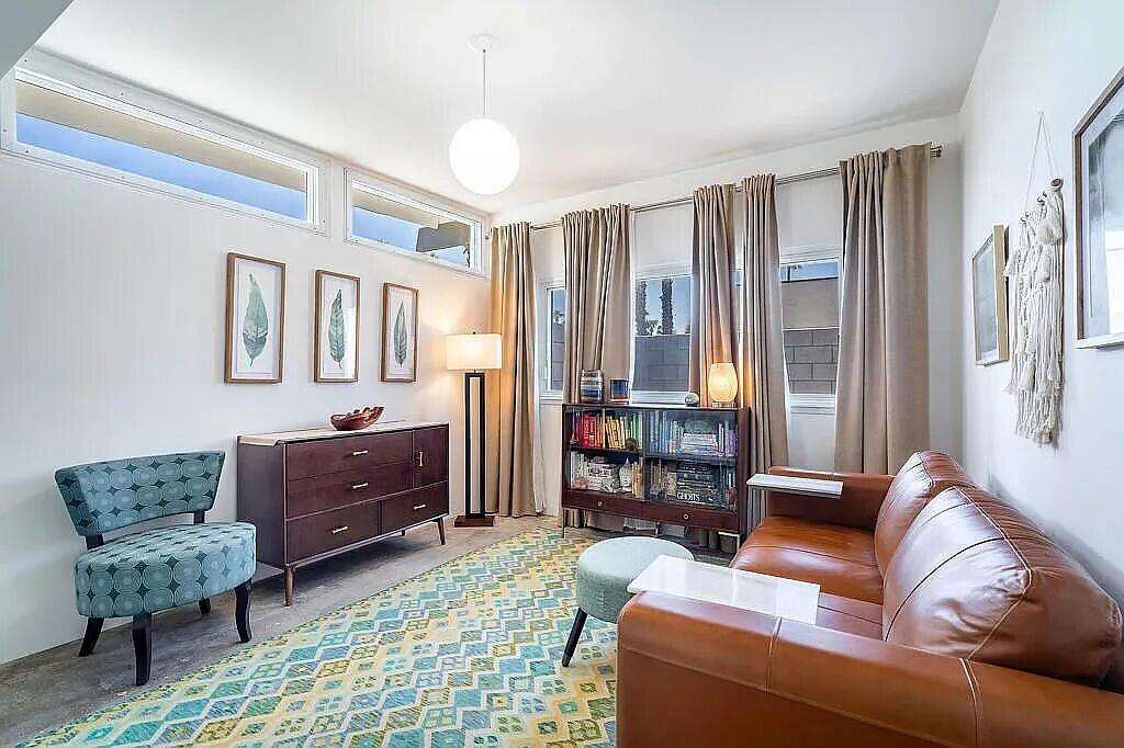 2223 North Magnolia Road Palm Springs, CA 92262 - Photo 19 of 28 a living room with furniture and a rug
