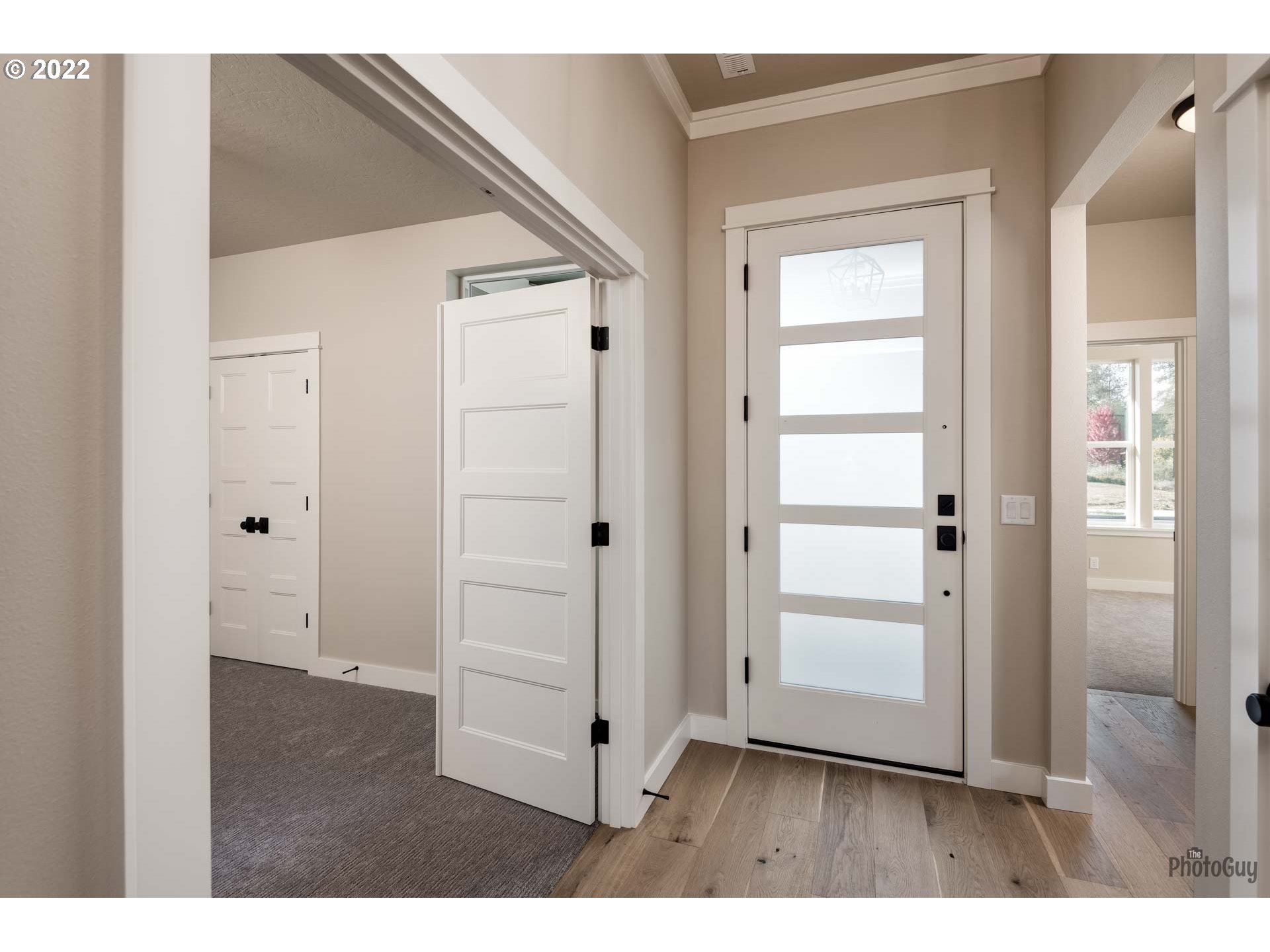 1011 South 33rd Springfield, OR 97478 - Photo 3 of 32 a view of an entryway with wooden floor