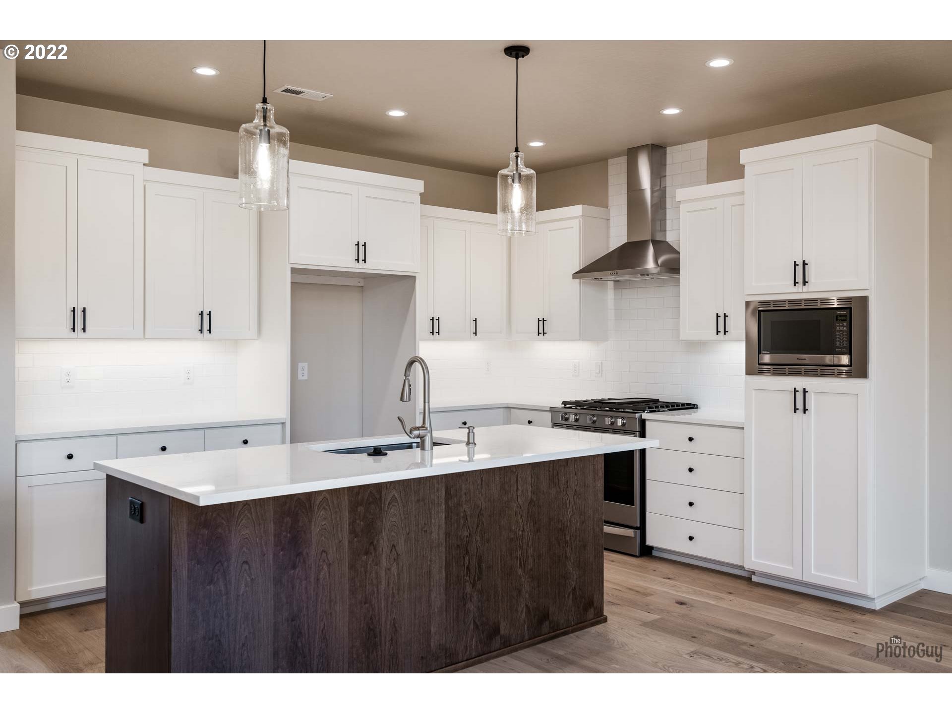 1011 South 33rd Springfield, OR 97478 - Photo 9 of 32 a kitchen with stainless steel appliances a sink stove and refrigerator