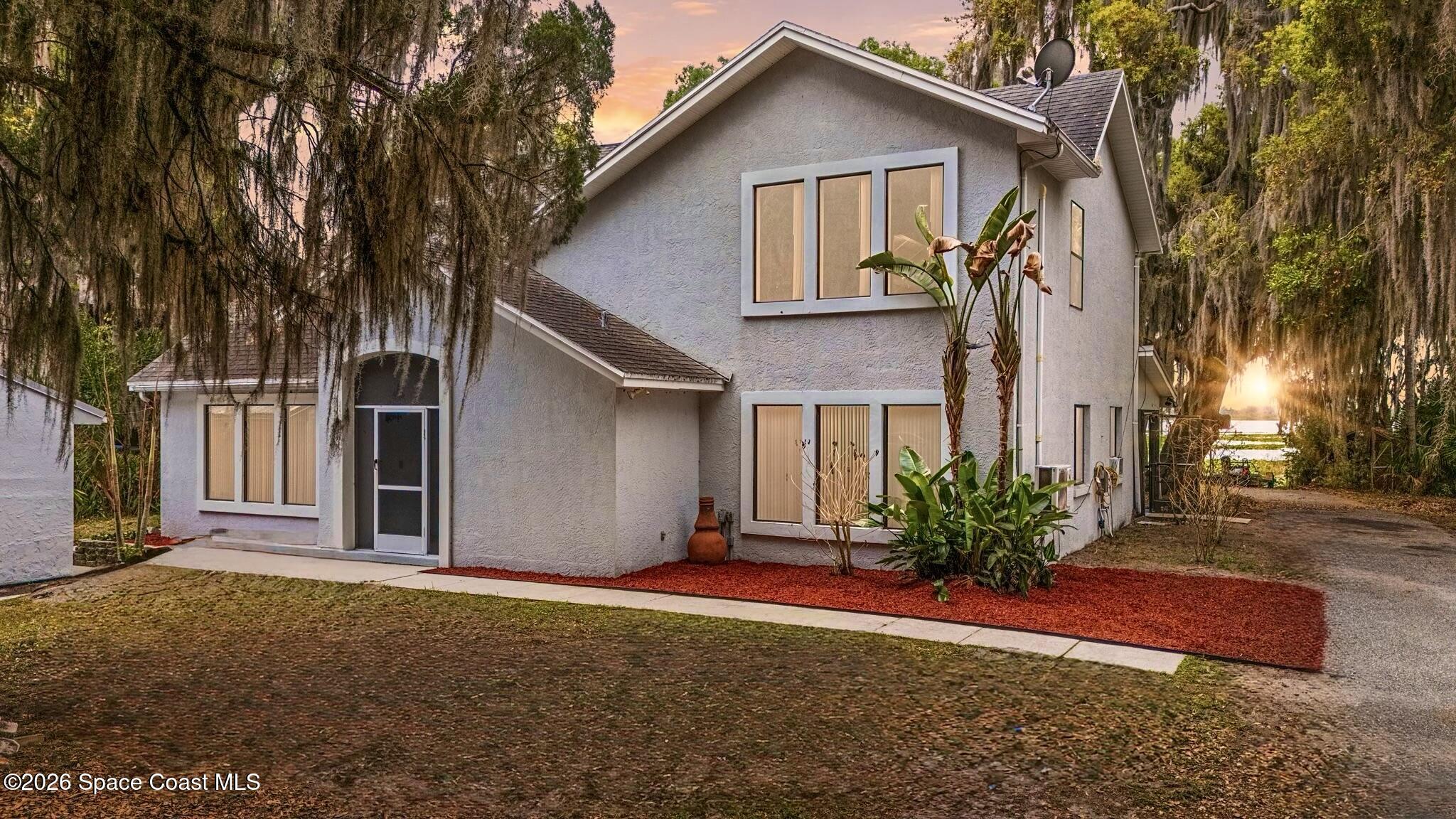 130 North Carpenter Road Titusville, FL 32796 - Photo 1 of 30 Dusk