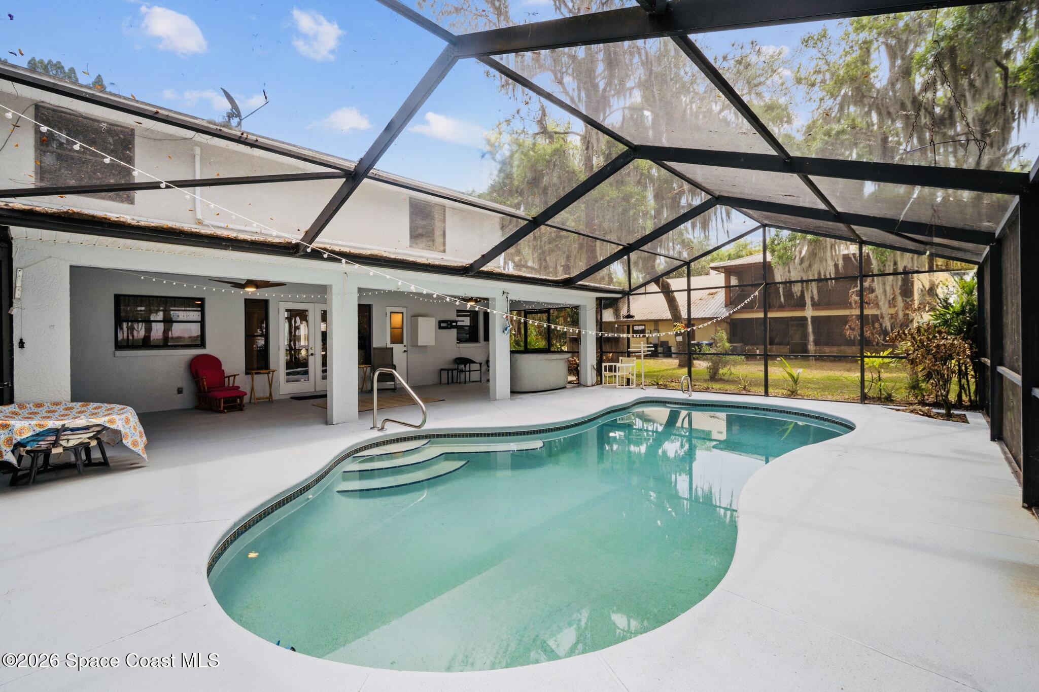 130 North Carpenter Road Titusville, FL 32796 - Photo 13 of 32 Pool screened Enclosure