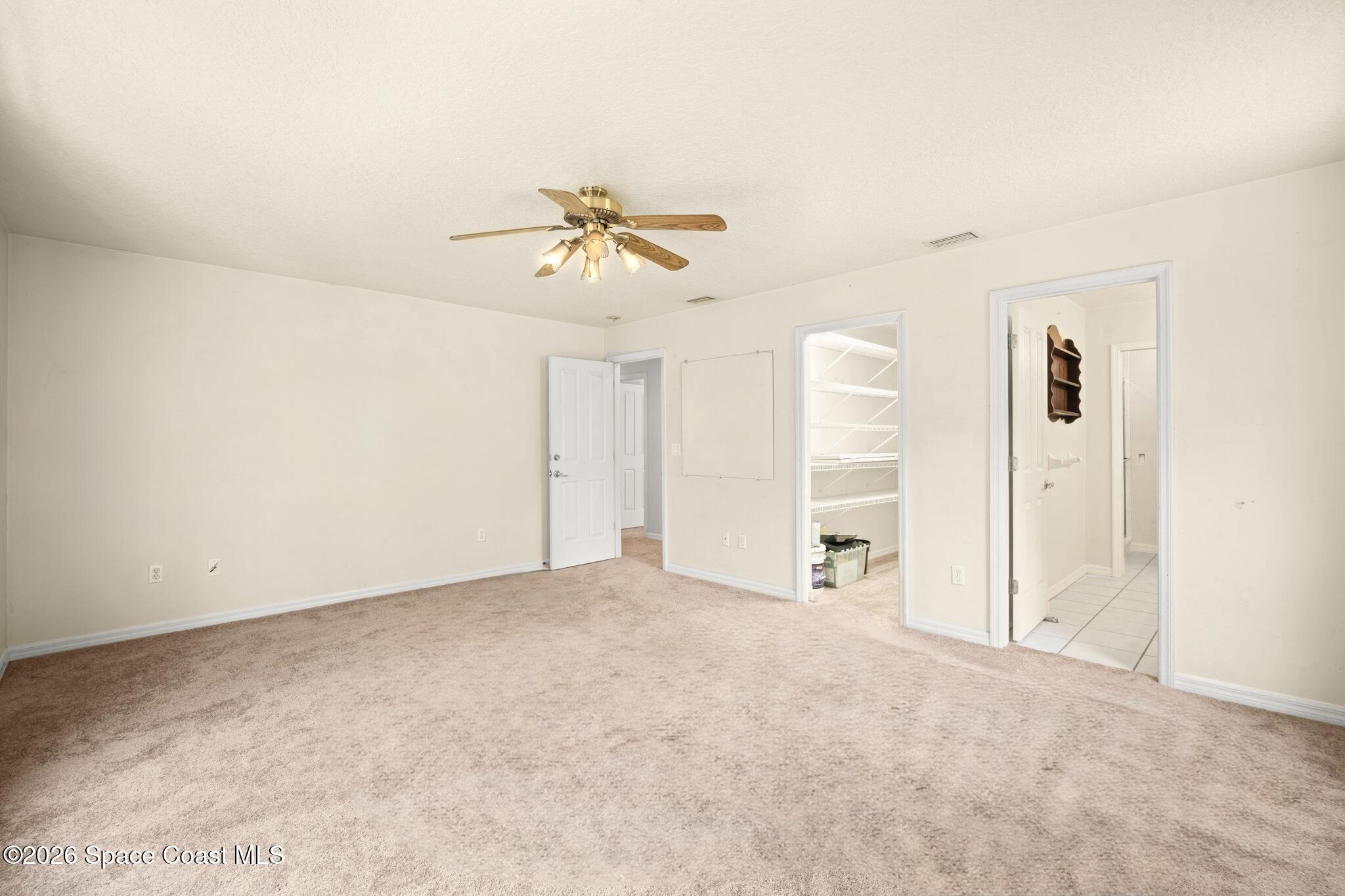130 North Carpenter Road Titusville, FL 32796 - Photo 13 of 30 Primary closet view