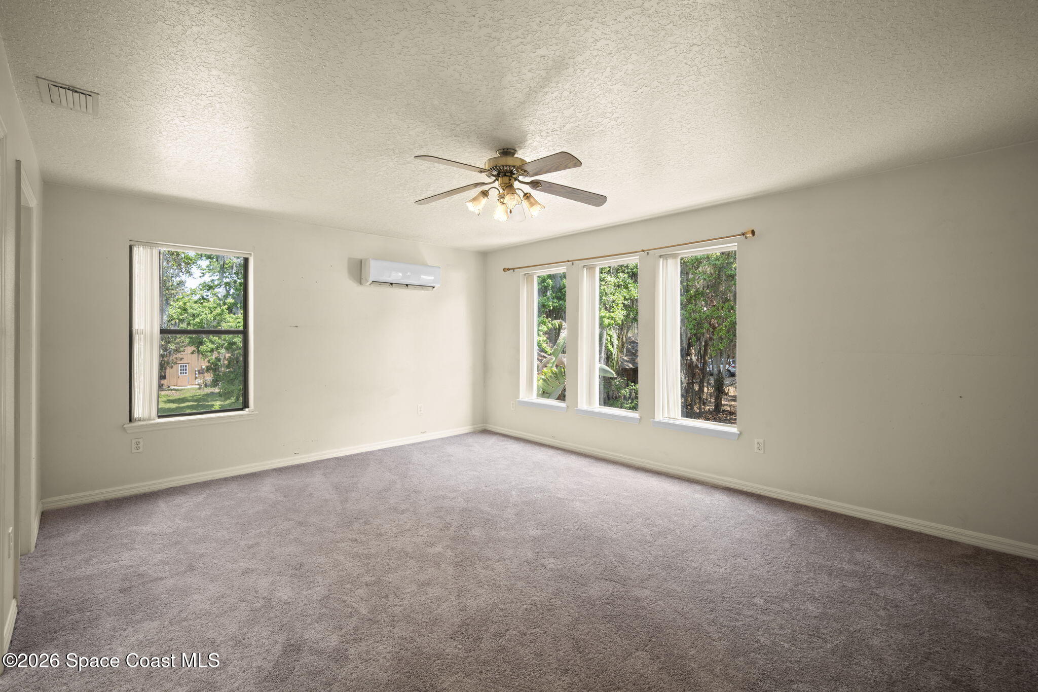 130 North Carpenter Road Titusville, FL 32796 - Photo 21 of 32 Bed#4 Owners Suite from Doorway