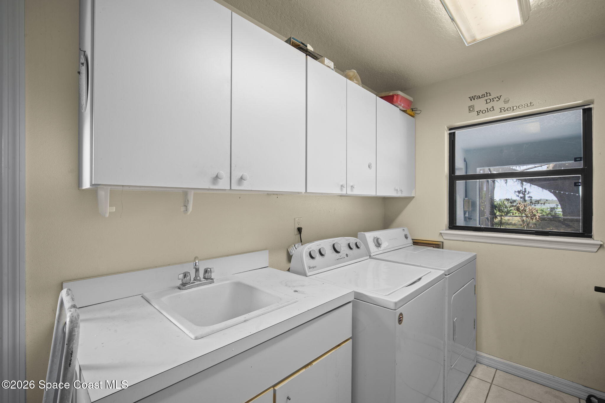 130 North Carpenter Road Titusville, FL 32796 - Photo 10 of 32 Designated laundry Room