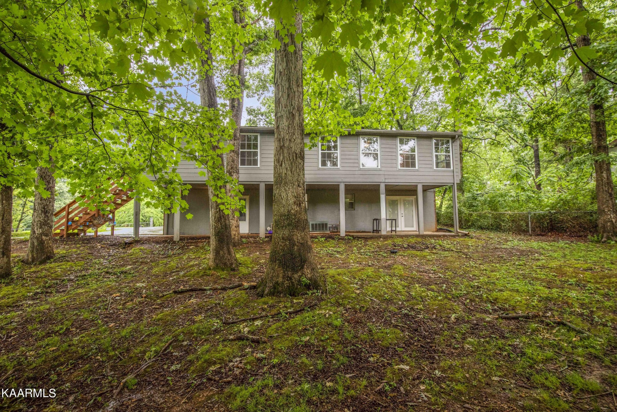 233 Geronimo Road Knoxville, TN 37934 - Photo 39 of 40 a front view of a house with a yard