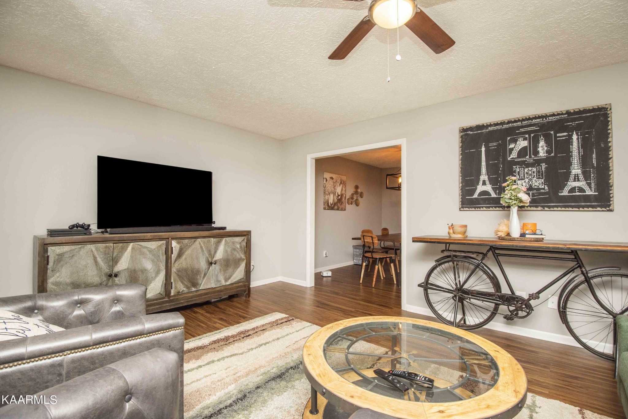 233 Geronimo Road Knoxville, TN 37934 - Photo 5 of 40 a living room with furniture and a flat screen tv