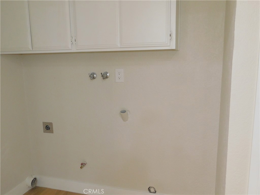 10456 Napa Road Adelanto, CA 92301 - Photo 14 of 31 a view of a utility room