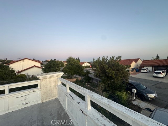 1710 Loma Road Montebello, CA 90640 - Photo 4 of 7 a kitchen with stainless steel appliances white cabinets and a stove