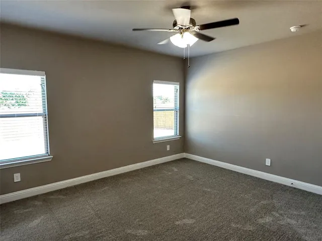 a bathroom with a bathtub and a sink