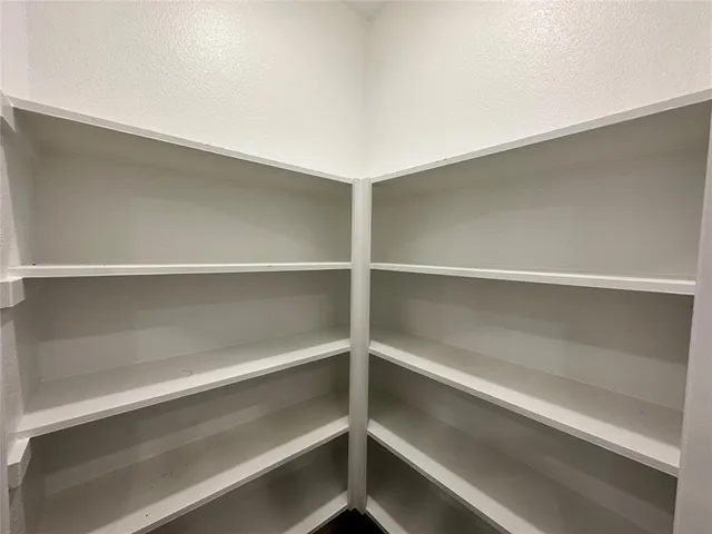 a view of room with walk in closet