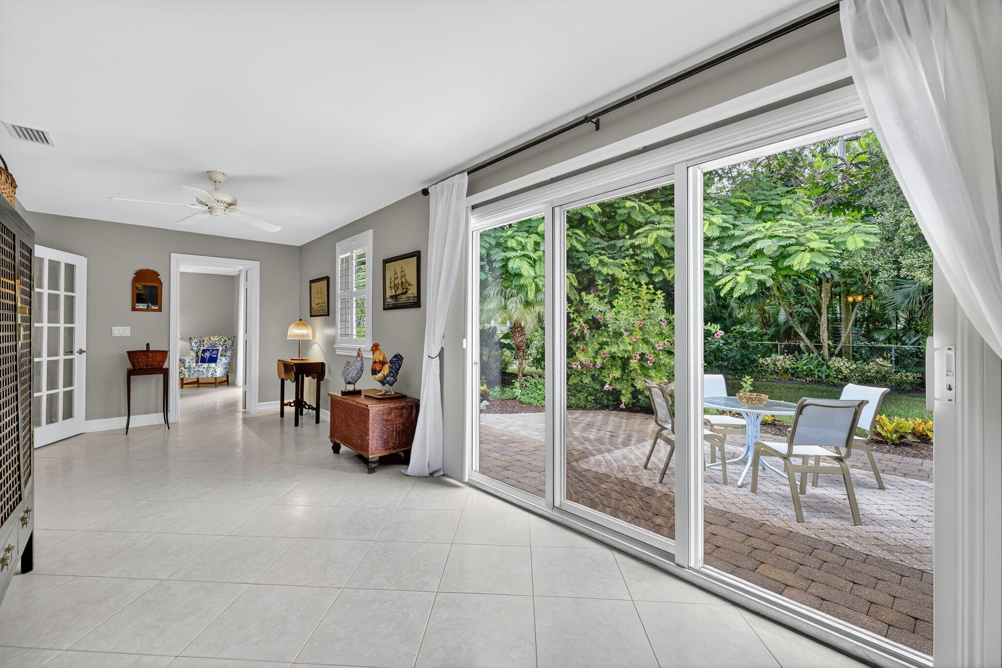 4 Rio Vista Drive Sewall's Point, FL 34996 - Photo 11 of 19 a dining room with furniture and a floor to ceiling window