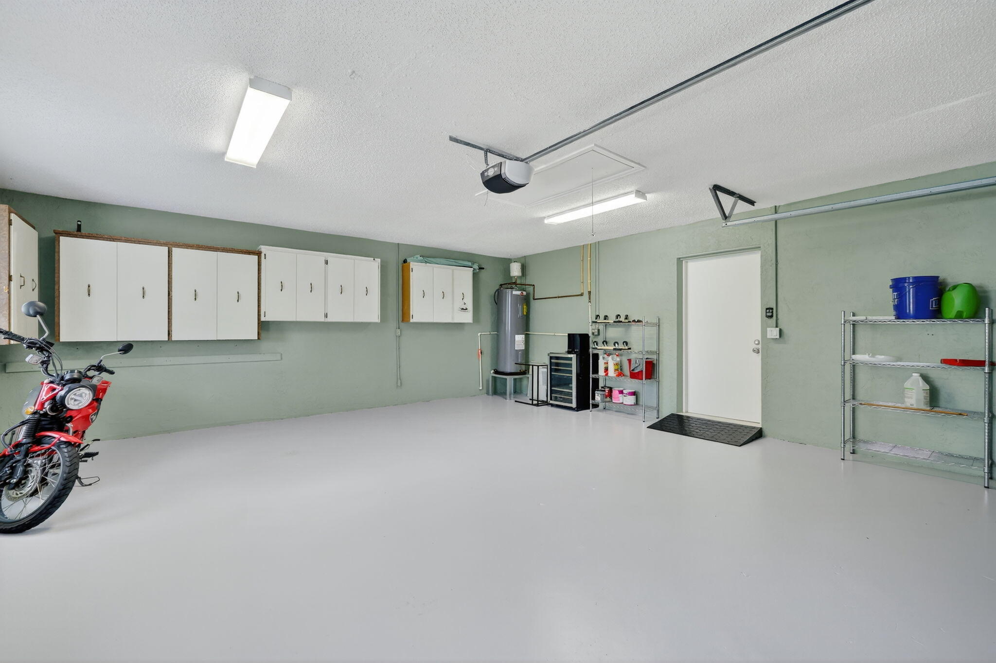 4 Rio Vista Drive Sewall's Point, FL 34996 - Photo 16 of 19 a view of a room with garage