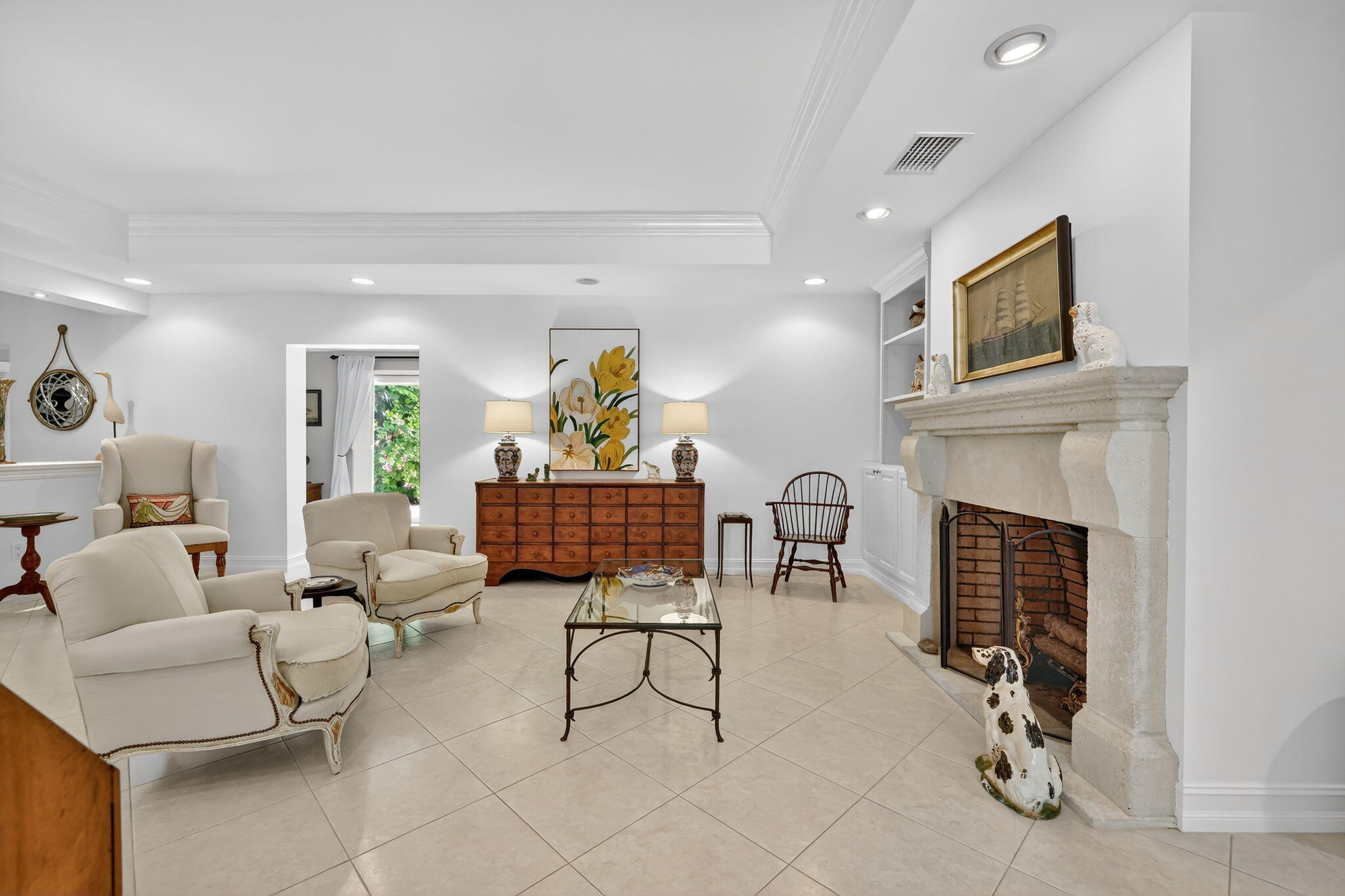 4 Rio Vista Drive Sewall's Point, FL 34996 - Photo 4 of 19 a living room with furniture and a fireplace