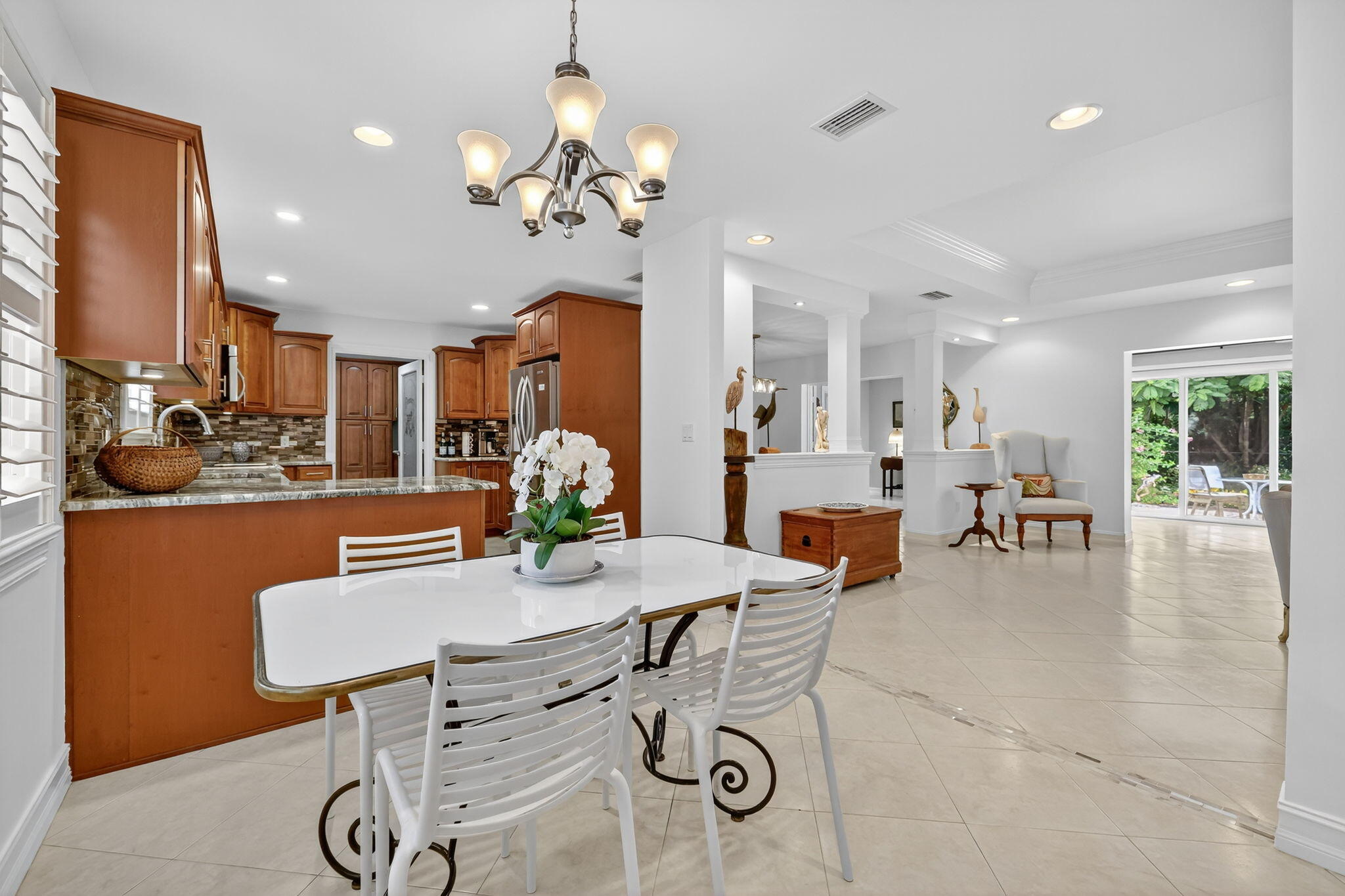 4 Rio Vista Drive Sewall's Point, FL 34996 - Photo 7 of 19 a view of a dining room with furniture and wooden floor