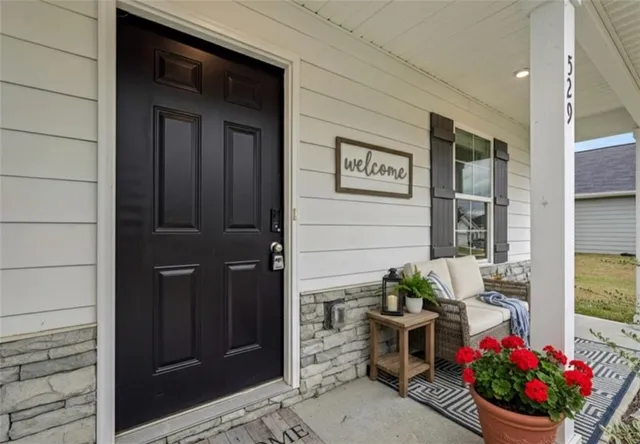 a view of a entryway door front of house