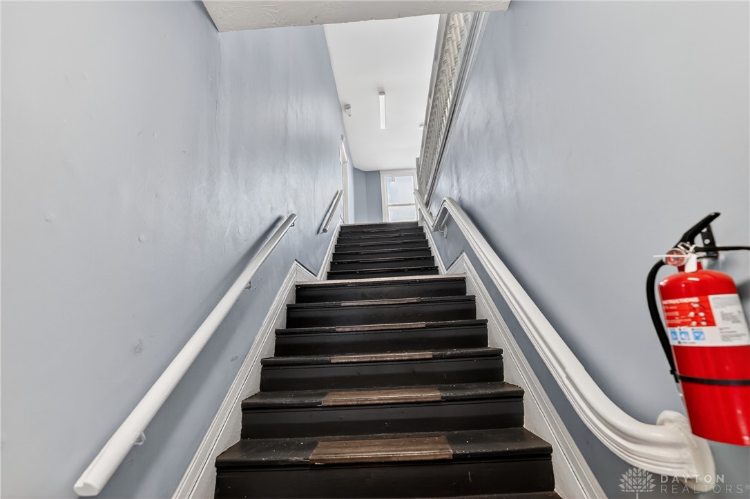 7045-7049 Montgomery Road Cincinnati, OH 45236 - Photo 20 of 68 Navigate easily between levels on these sturdy and practical stairs.