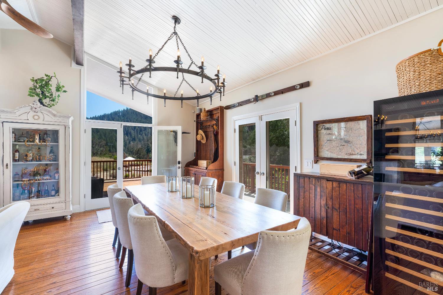 5270 Dry Creek Road Napa, CA 94558 - Photo 11 of 56 a view of a dining room with furniture window and wooden floor