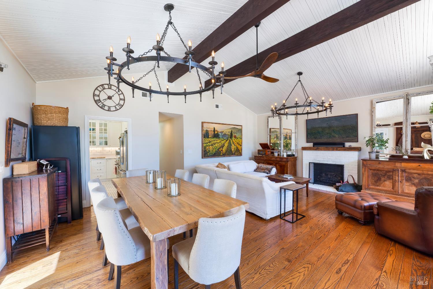 5270 Dry Creek Road Napa, CA 94558 - Photo 13 of 56 a view of a dining room with furniture wooden floor and chandelier