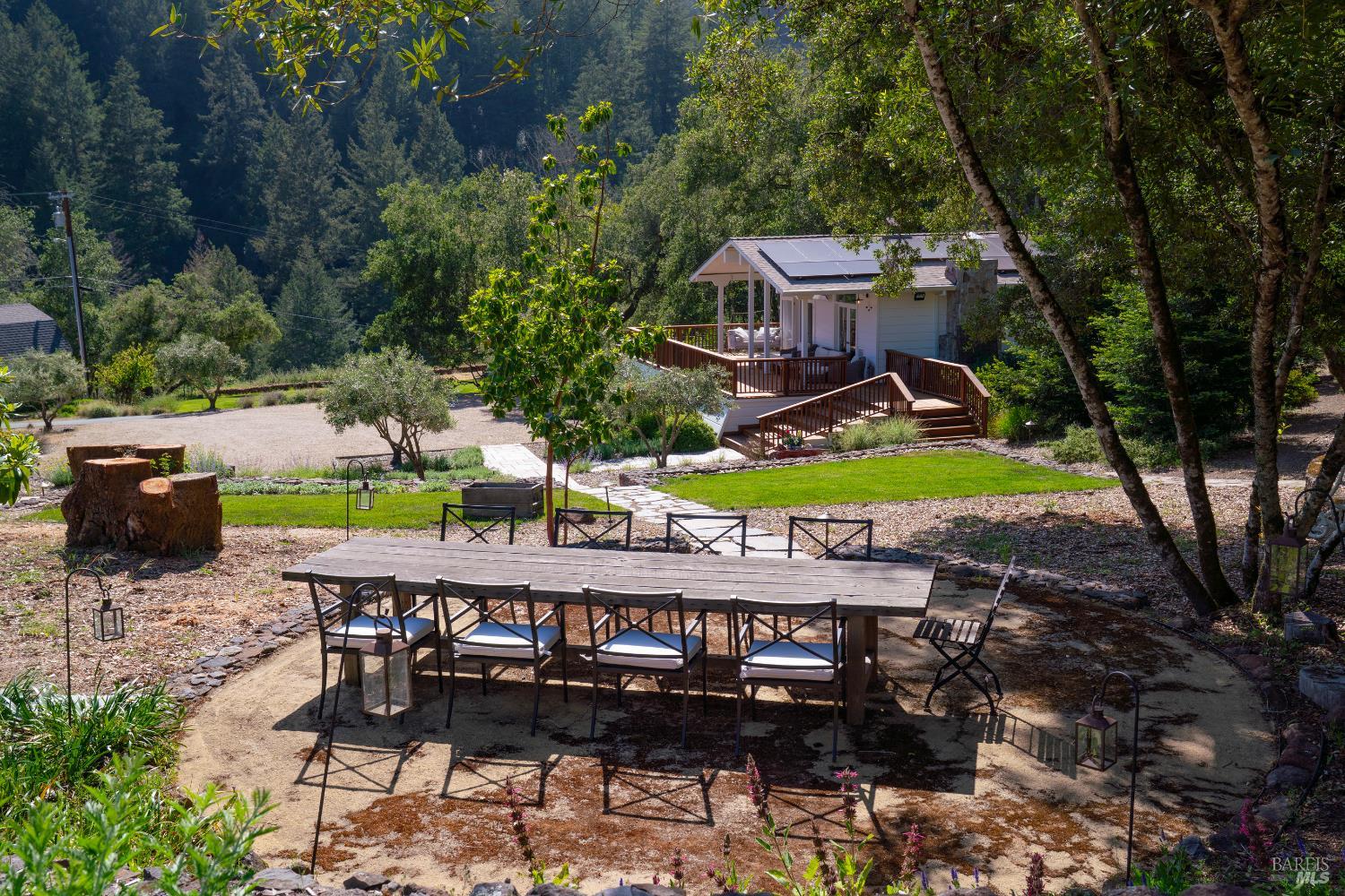 5270 Dry Creek Road Napa, CA 94558 - Photo 35 of 56 a view of a chairs and table in the patio