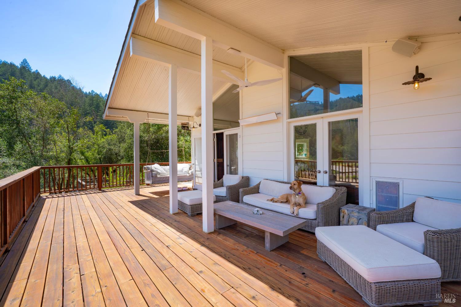 5270 Dry Creek Road Napa, CA 94558 - Photo 6 of 56 a balcony with wooden floor and outdoor seating