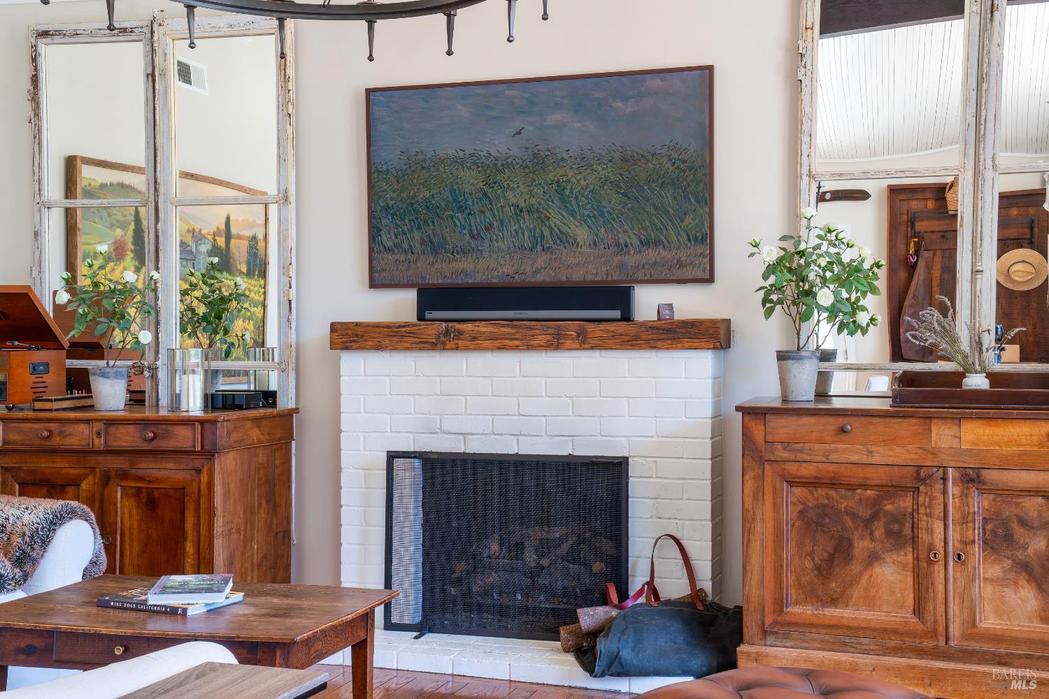 5270 Dry Creek Road Napa, CA 94558 - Photo 9 of 56 a living room with furniture and a fireplace
