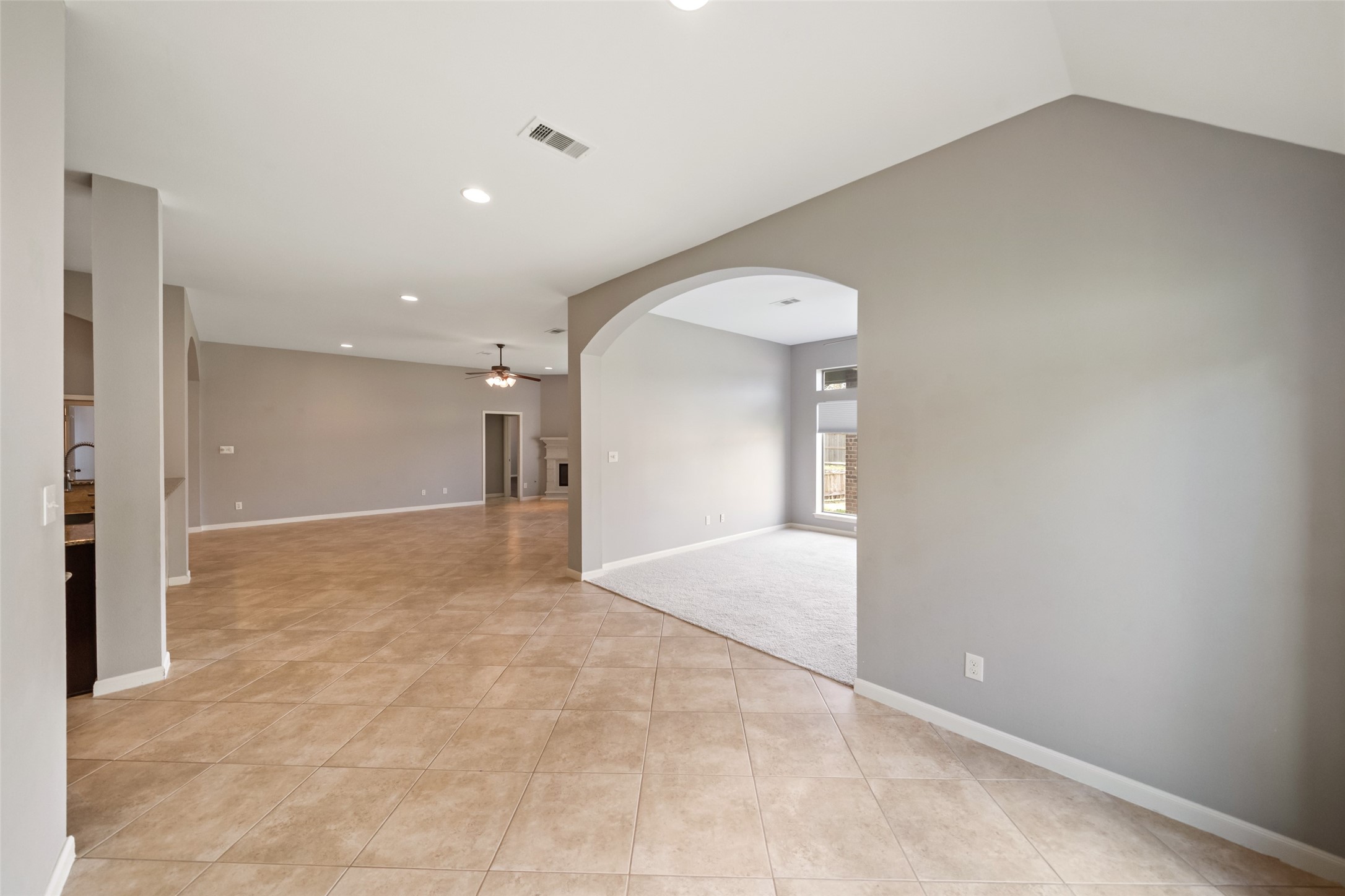 2818 Red Maple Drive Katy, TX 77494 - Photo 27 of 50 a view of an empty room and a kitchen
