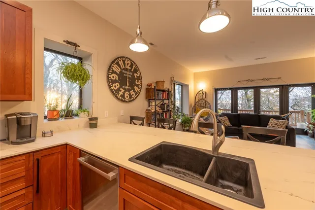 a view of a chair and table in the balcony