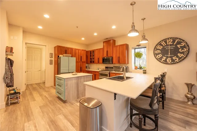a view of balcony with wooden fence and floor