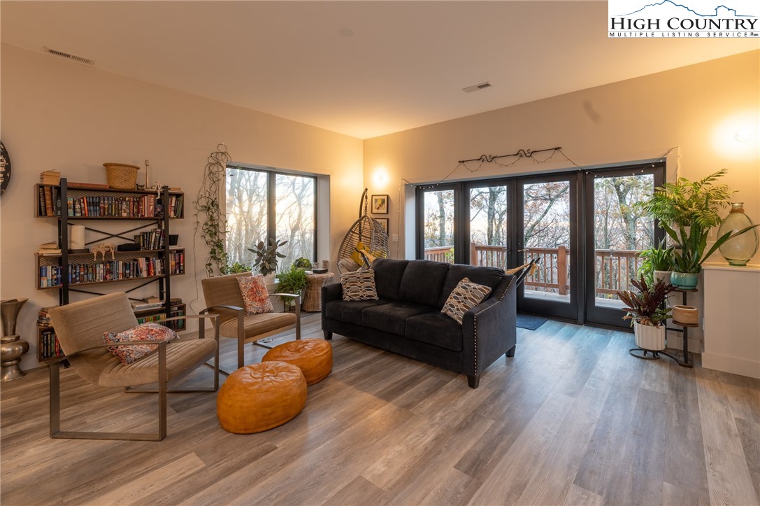 1390 Ransey Woodring Road Todd, NC 28684 - Photo 14 of 48 a living room with furniture and a large window