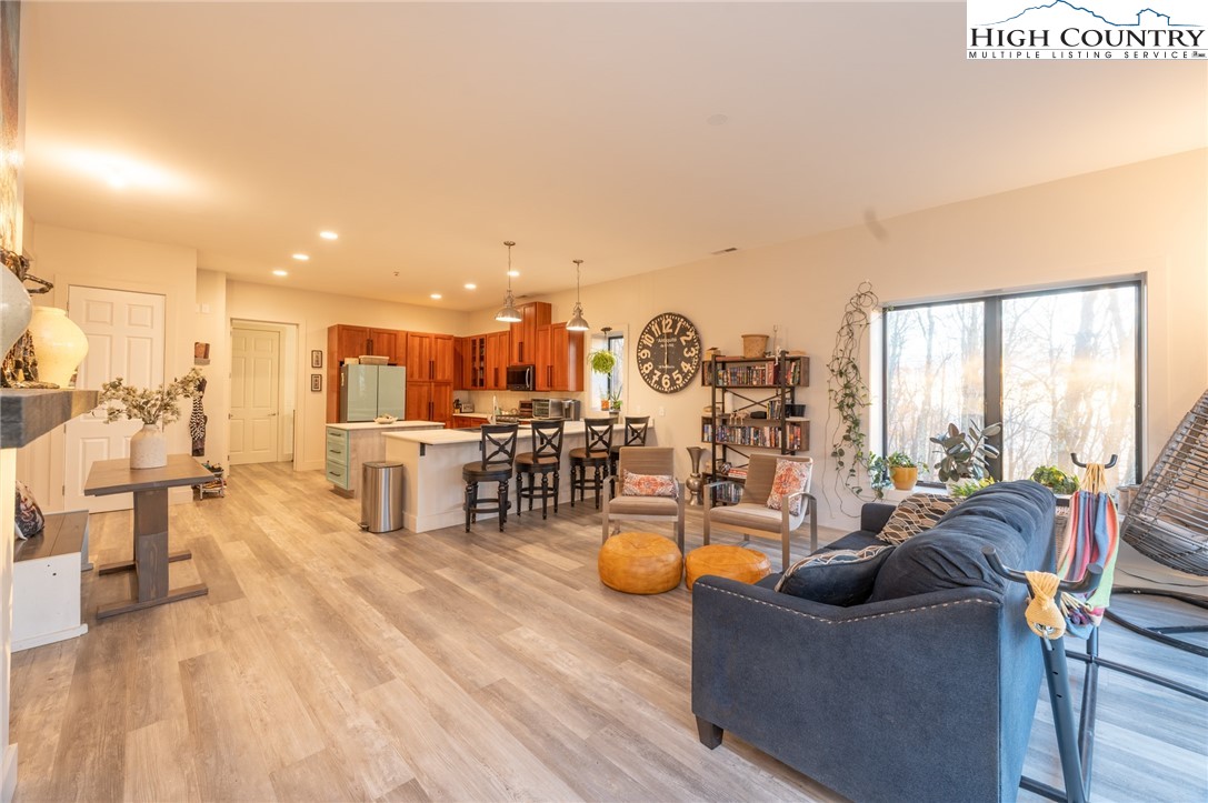 1390 Ransey Woodring Road Todd, NC 28684 - Photo 15 of 48 a living room with furniture and a large window