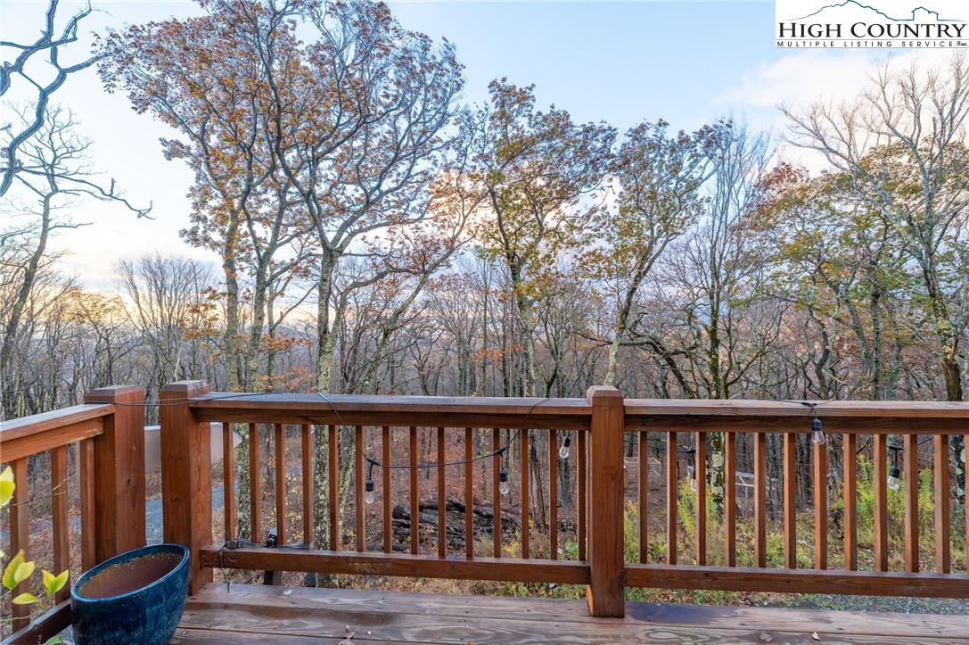 1390 Ransey Woodring Road Todd, NC 28684 - Photo 17 of 48 a view of balcony with wooden fence and floor