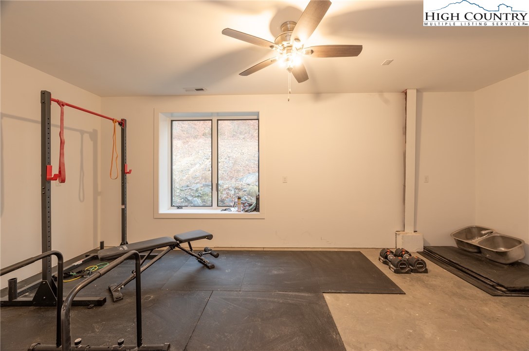 1390 Ransey Woodring Road Todd, NC 28684 - Photo 34 of 48 a view of a room with gym equipment