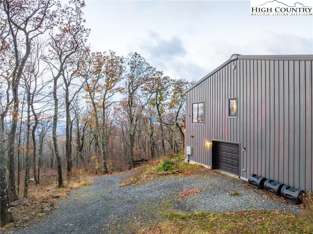 a view of a bench in a garden