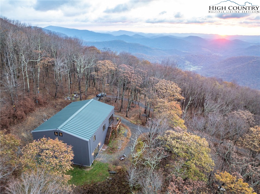 1390 Ransey Woodring Road Todd, NC 28684 - Photo 4 of 48 a view of a yard in front of the house