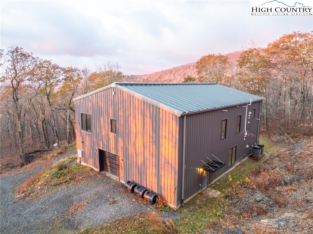 1390 Ransey Woodring Road Todd, NC 28684 - Photo 7 of 48 a house view with a backyard space