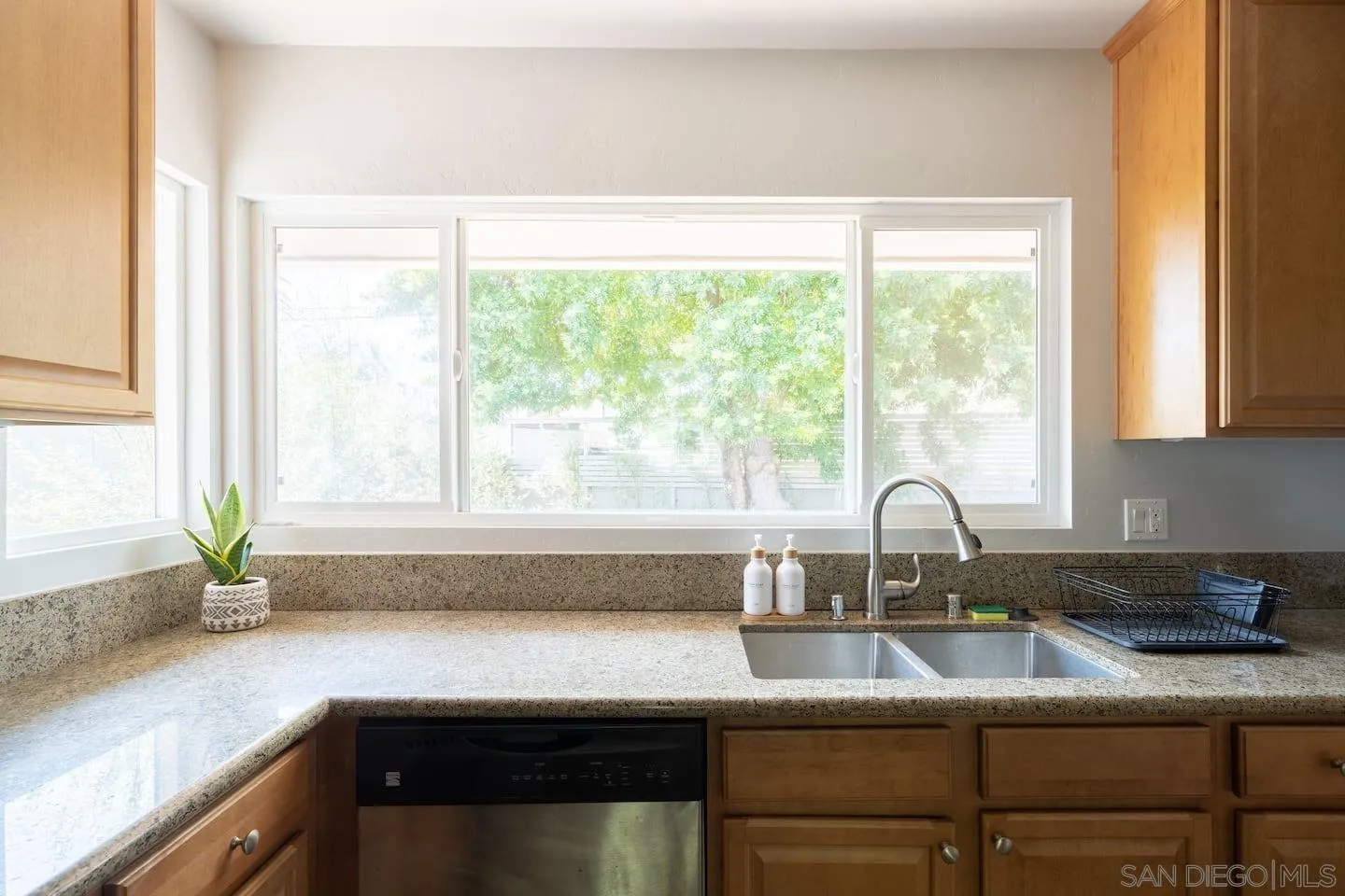 5238 La Jolla Boulevard San Diego, CA 92037 - Photo 18 of 46 a kitchen with a sink and a window