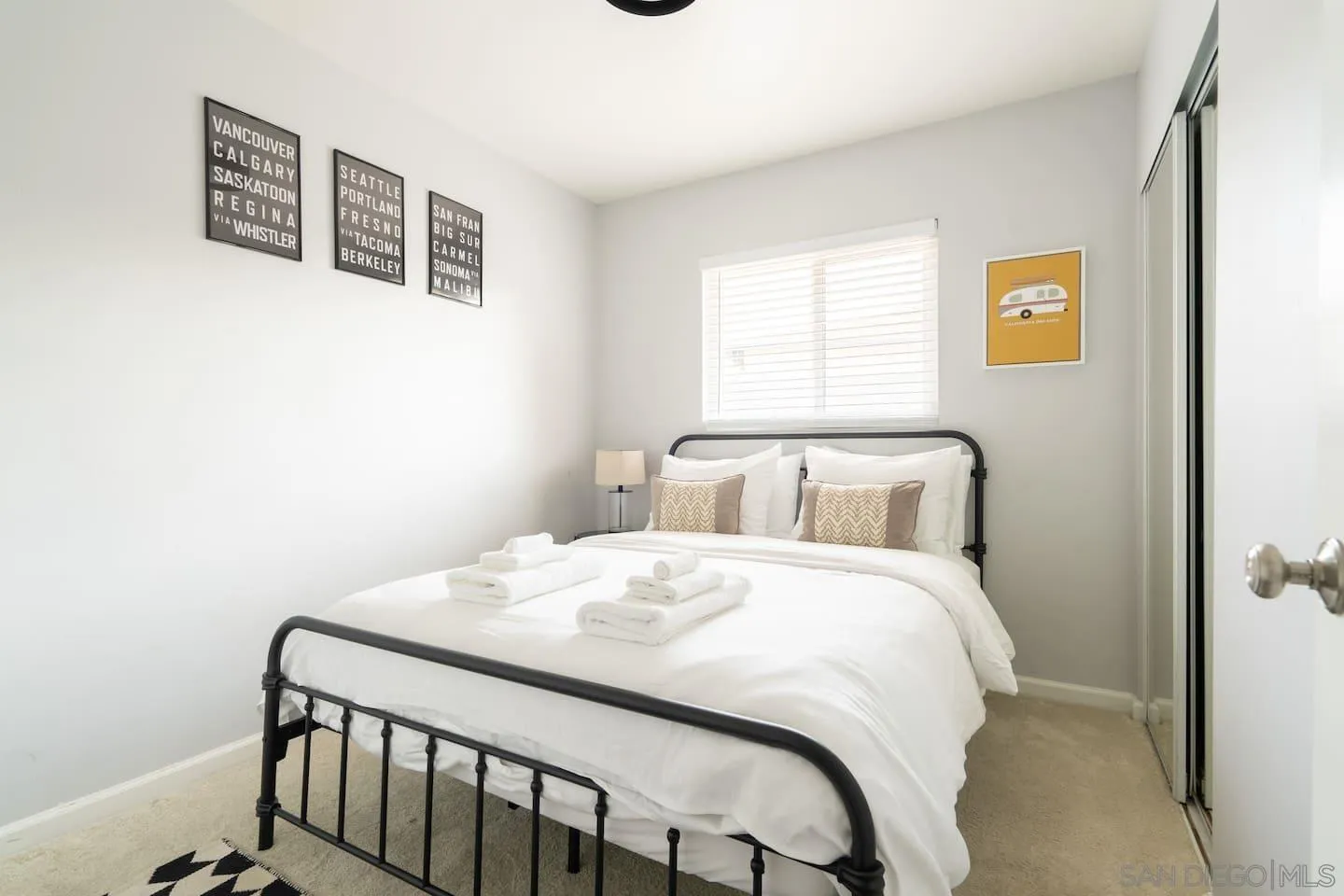 5238 La Jolla Boulevard San Diego, CA 92037 - Photo 42 of 46 a bedroom with a bed and wooden floor