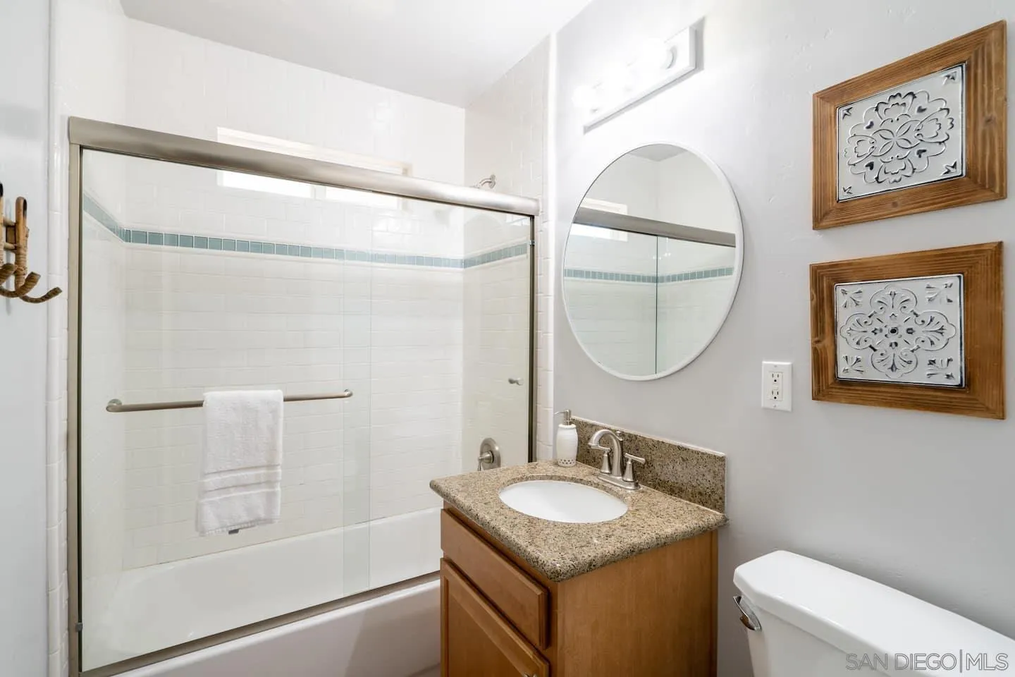 5238 La Jolla Boulevard San Diego, CA 92037 - Photo 44 of 46 a bathroom with a sink and a mirror