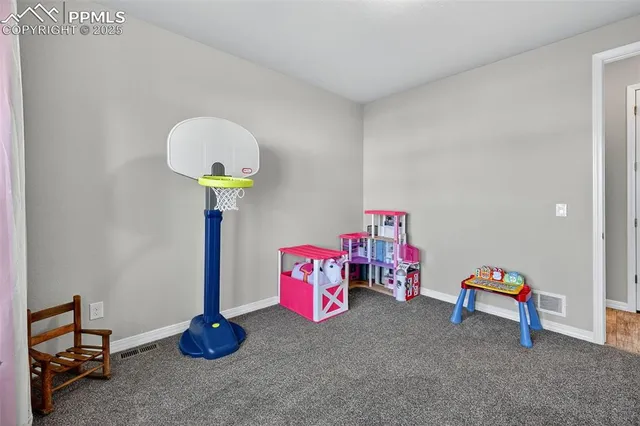 a room with toys and a table